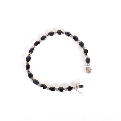 SILVER BRACELET WITH BLUE STONES
Silver bracelet,...