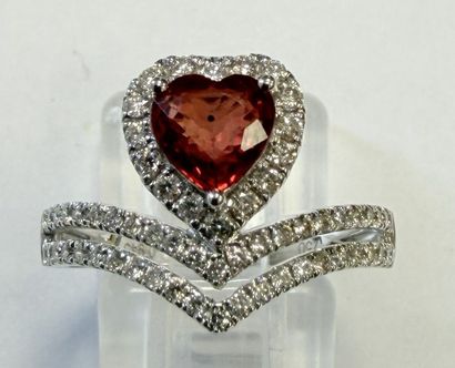 DESIGNER RING IN WHITE GOLD SET WITH A SAPPHIRE...