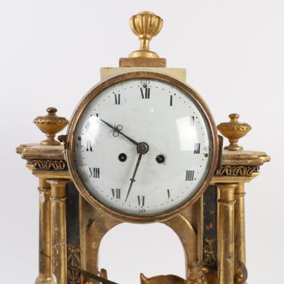 LOUIS XVI-ERA WOODEN CLOCK
Wood and gilded...