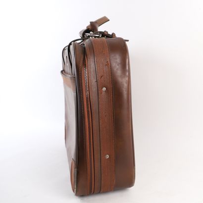 LANCEL CHOCOLATE LEATHER SUITCASE
Chocolate-colored...