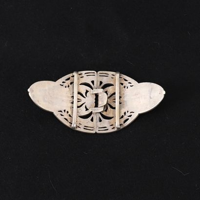 SILVER BELT BUCKLE
Two-piece buckle decorated...