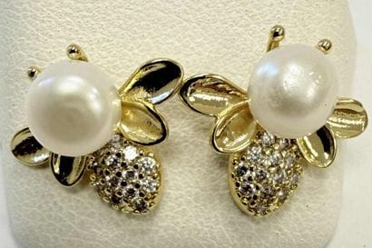 PAIR OF GOLD-PLATED EARRINGS FEATURING STYLIZED...