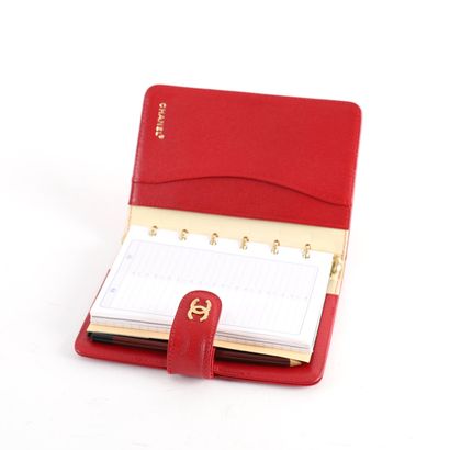 RED CHANEL DIARY CASE
Red leather Chanel...