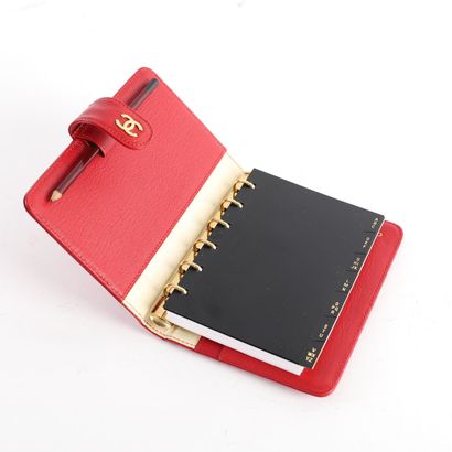RED CHANEL DIARY CASE
Red leather Chanel...