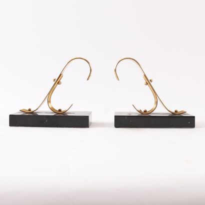 PAIR OF GOLD STARRY BOOKENDS, 20th Century
Made...