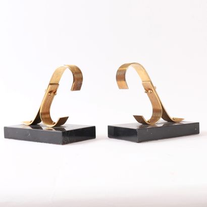 PAIR OF GOLD STARRY BOOKENDS, 20th Century
Made...