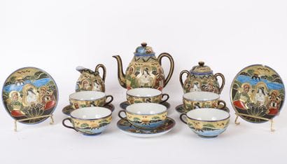 ASIAN DECOR TEA SERVICE
Includes 6 cups,...
