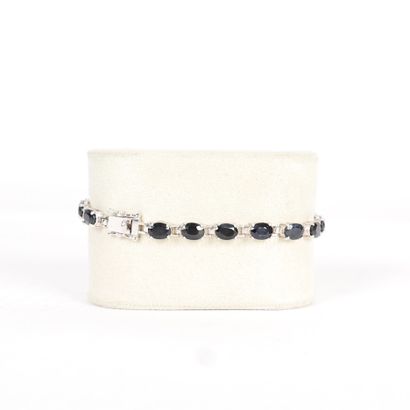 SILVER BRACELET WITH BLUE STONES
Silver bracelet,...