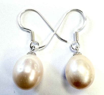 PAIR OF SILVER EARRINGS ADORNED WITH PEARLS
Pair...
