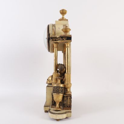 LOUIS XVI-ERA WOODEN CLOCK
Wood and gilded...