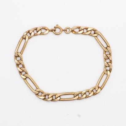 GILDED METAL BRACELET WITH FIGARO LINKS
L...
