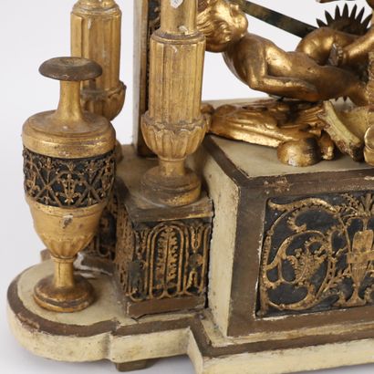 LOUIS XVI-ERA WOODEN CLOCK
Wood and gilded...