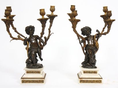 PAIRE DE CANDÉLABRES

D’après Clodion représentant...