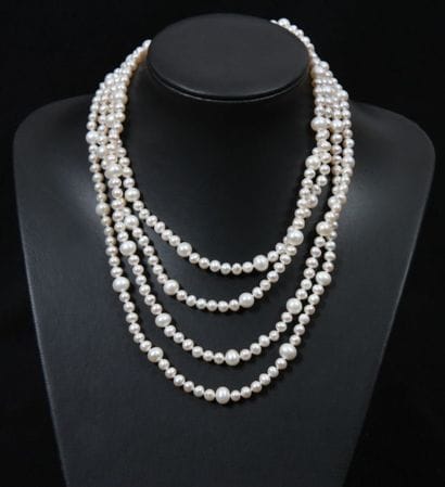 SAUTOIR EN PERLES

De tailles 6,5 et 8,5...