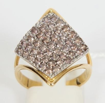 BAGUE EN OR JAUNE ET BLANC ET AMETHYSTES

De...