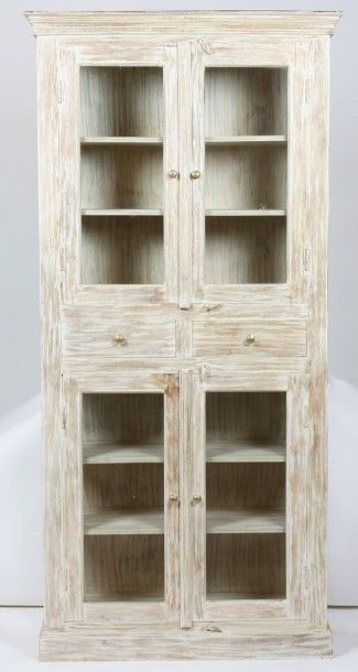 VITRINE EN BOIS LAQUE PATINE

Ouvrant en...