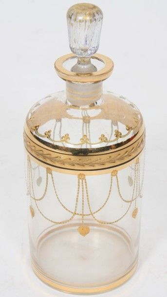 CARAFON

En verre, à décor en relief doré.

Epoque...