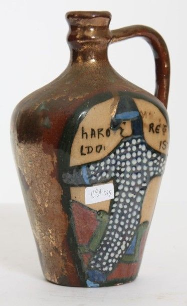 1 bouteille en grès vernissé.

Décor polychrome...