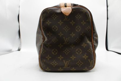 LOUIS VUITTON. Sac Keepall en toile monogramme...