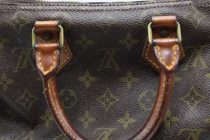 LOUIS VUITTON. Sac Speedy 25 en toile monogramme...