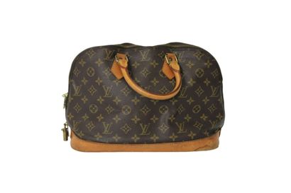 LOUIS VUITTON. Sac Alma en toile monogramme...