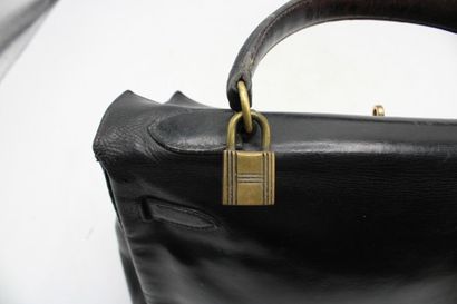 HERMES. Sac Kelly 32 retourné en box originellement...