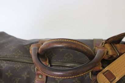 LOUIS VUITTON. Sac Keepall en toile monogramme...