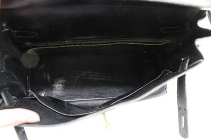 HERMES. Sac Kelly 32 retourné en cuir noir,...