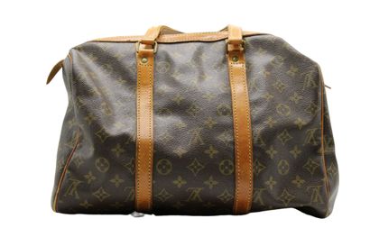 LOUIS VUITTON. Sac Keepall en toile monogramme...