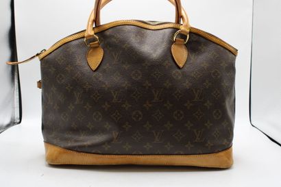 LOUIS VUITTON. Sac Lockit grand modèle en...