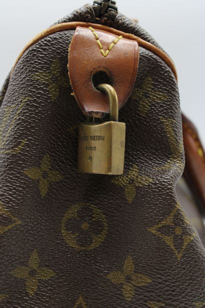 LOUIS VUITTON. Sac Speedy 25 en toile monogramme...
