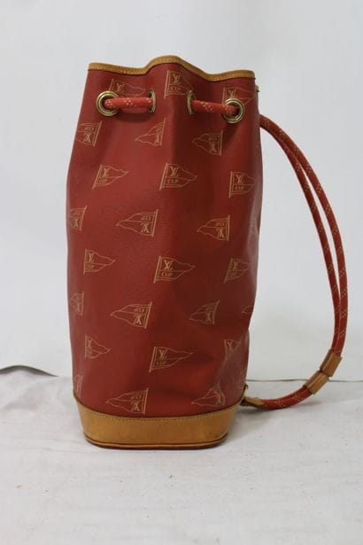 LOUIS VUITTON. Sac marin Cup en toile enduite...