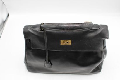 HERMES. Sac Kelly 32 retourné en box originellement...