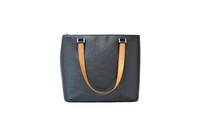 LOUIS VUITTON. Sac à main en cuir monogramme...