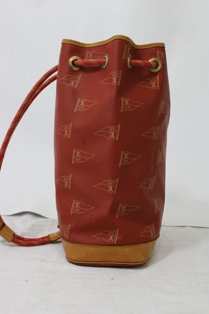 LOUIS VUITTON. Sac marin Cup en toile enduite...
