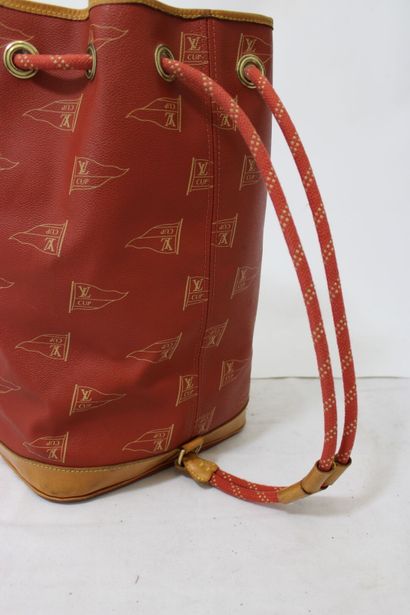 LOUIS VUITTON. Sac marin Cup en toile enduite...