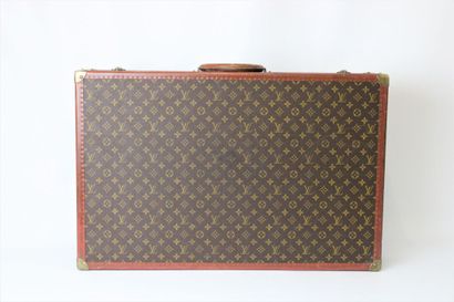 LOUIS VUITTON. Valise rigide Bisten en toile...