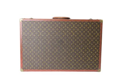 LOUIS VUITTON. Valise rigide Bisten en toile...