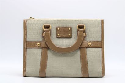 LOUIS VUITTON. Sac à main en chèvre beige...