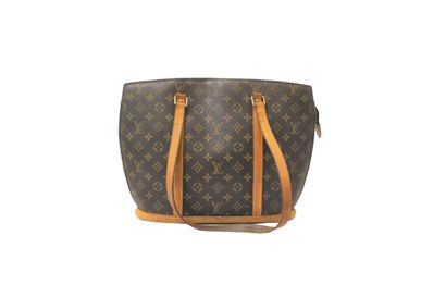 LOUIS VUITTON. Sac Babylone en toile monogramme...