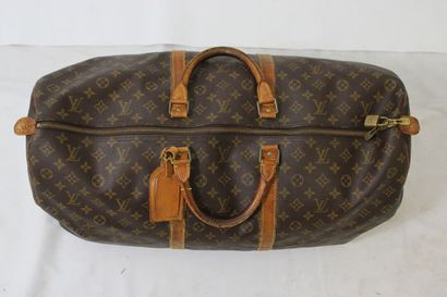 LOUIS VUITTON. Sac Keepall 60 en toile monogramme...