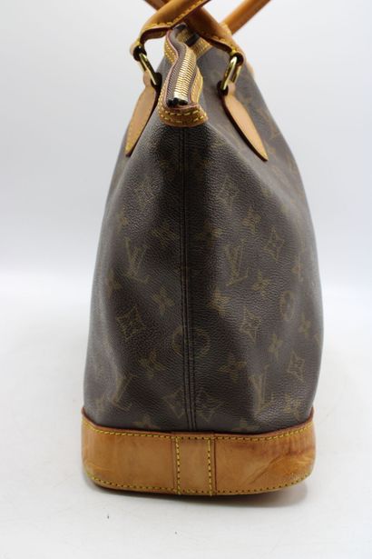 LOUIS VUITTON. Sac Lockit grand modèle en...