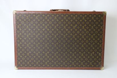 LOUIS VUITTON. Valise rigide Bisten en toile...