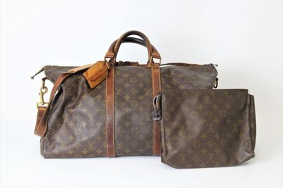 LOUIS VUITTON. Sac Keepall en toile monogramme...