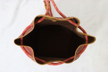LOUIS VUITTON. Sac marin Cup en toile enduite...