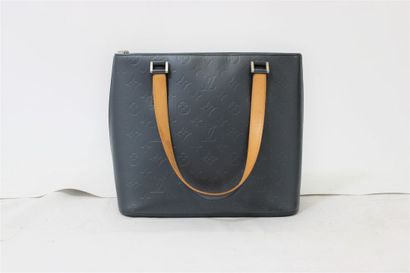 LOUIS VUITTON. Sac à main en cuir monogramme...