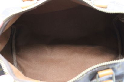 LOUIS VUITTON. Sac Speedy en toile monogramme...