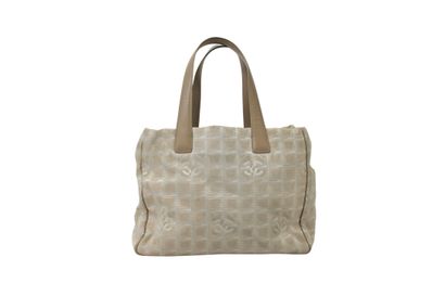 CHANEL. Sac cabas en tissu beige monogramme,...
