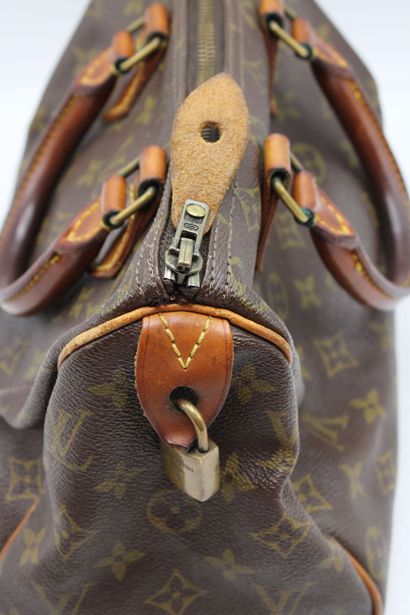 LOUIS VUITTON. Sac Speedy 25 en toile monogramme...
