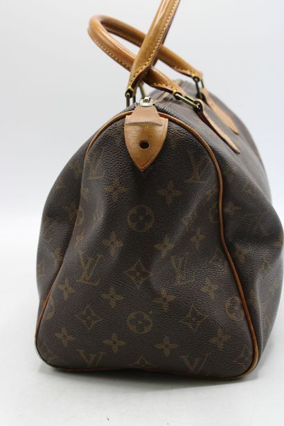 LOUIS VUITTON. Sac Speedy 30 en toile monogramme...